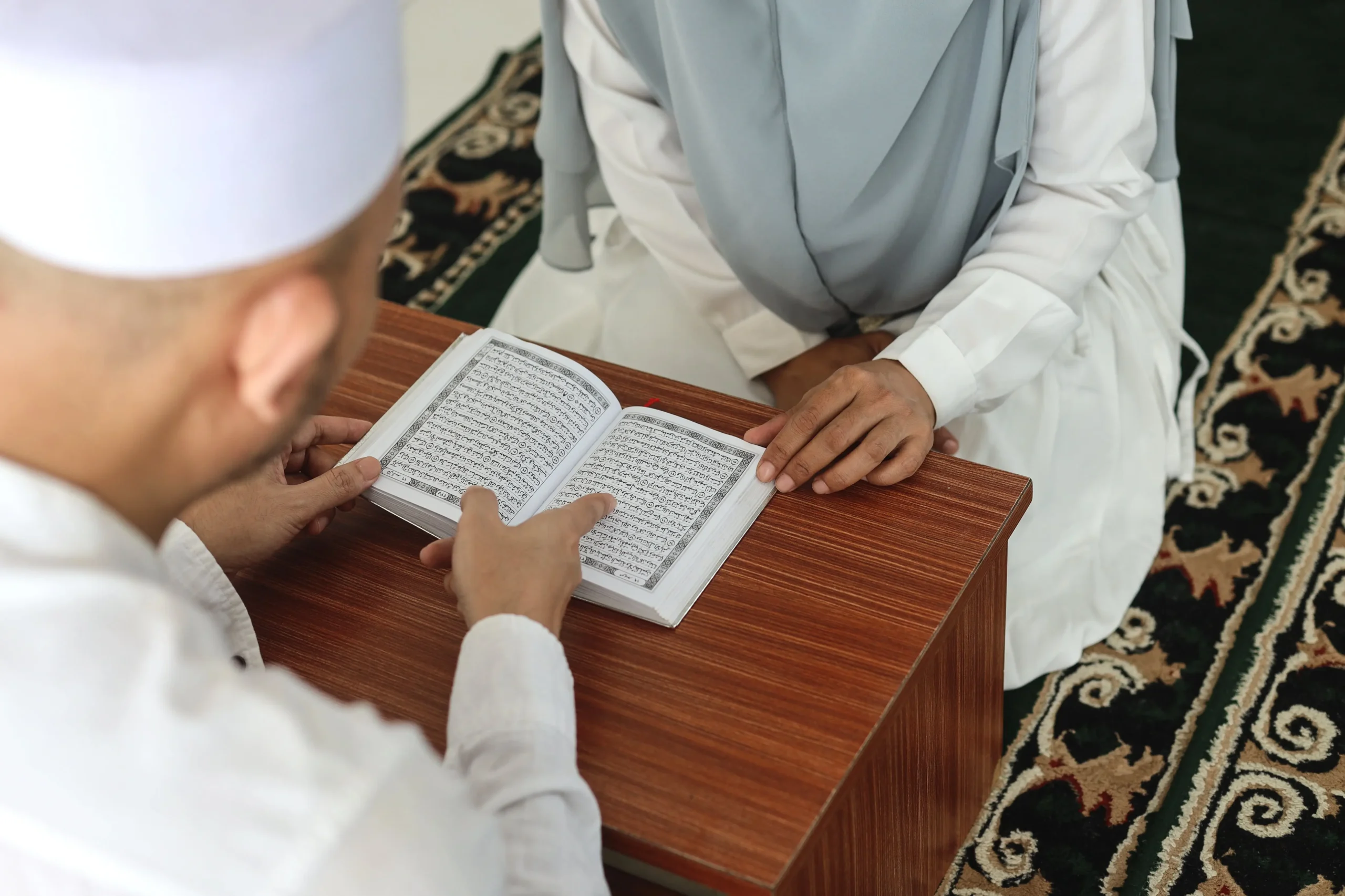 Home 10 asian-muslim-couple-reading-holy-quran-together